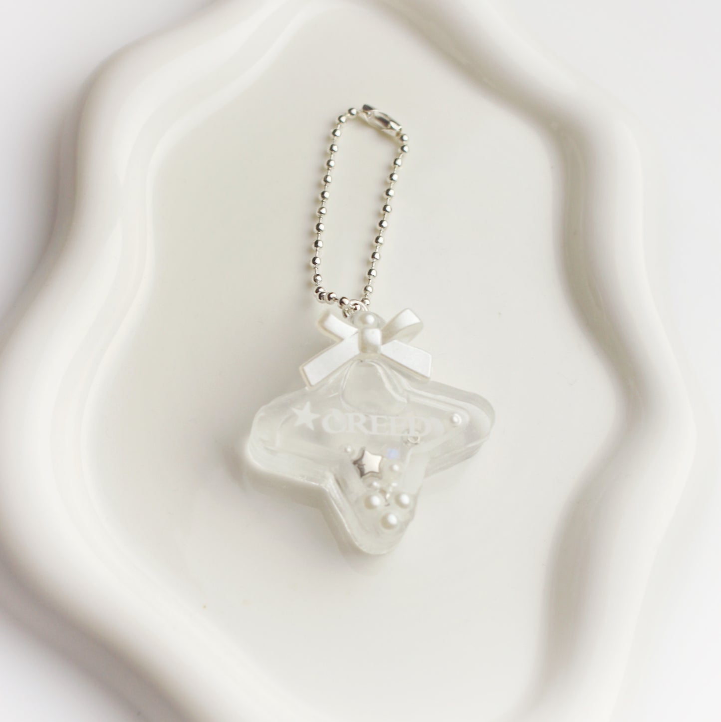 “Creed” star keychain