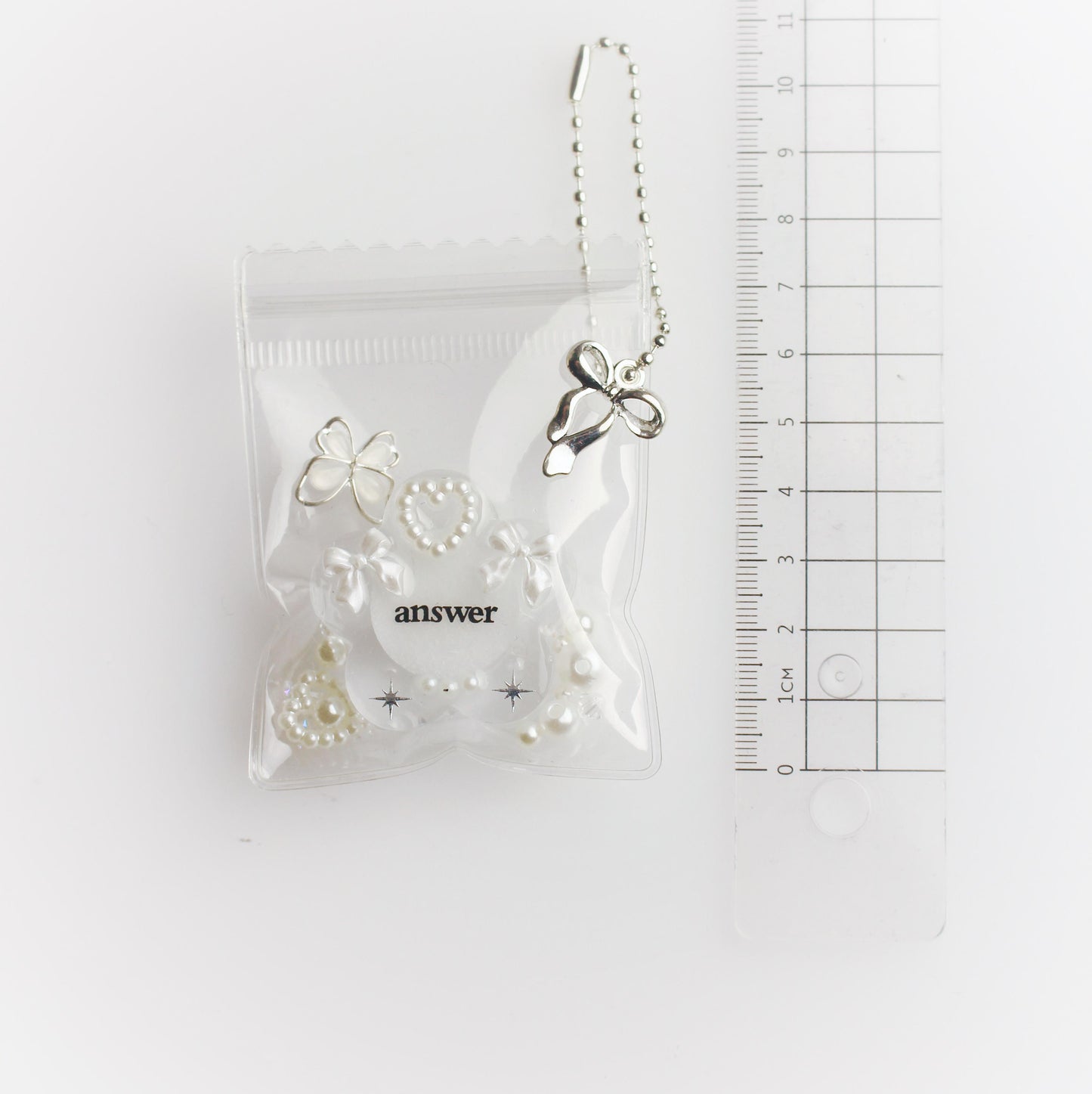 "Answer" flower pouch keychain