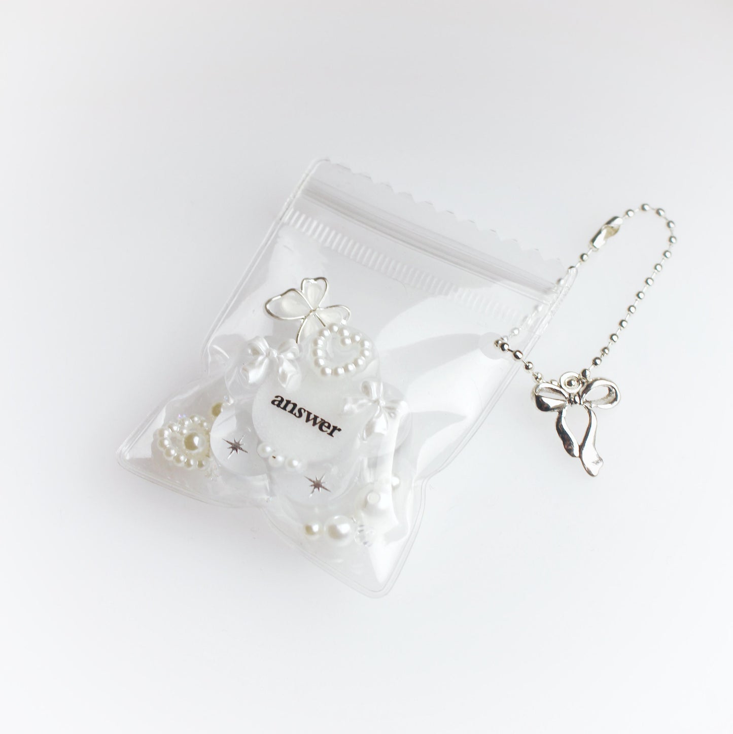 "Answer" flower pouch keychain