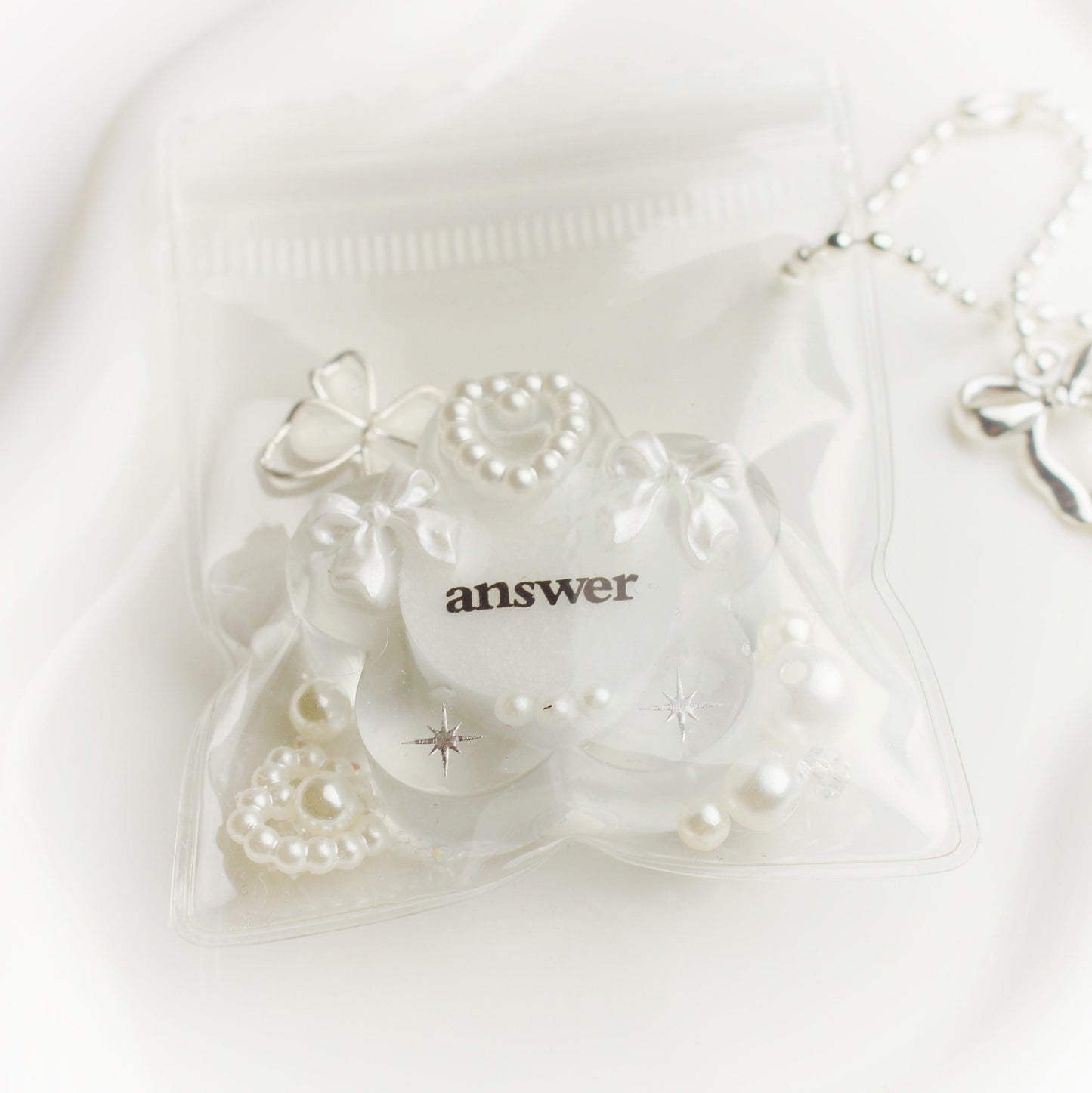 "Answer" flower pouch keychain