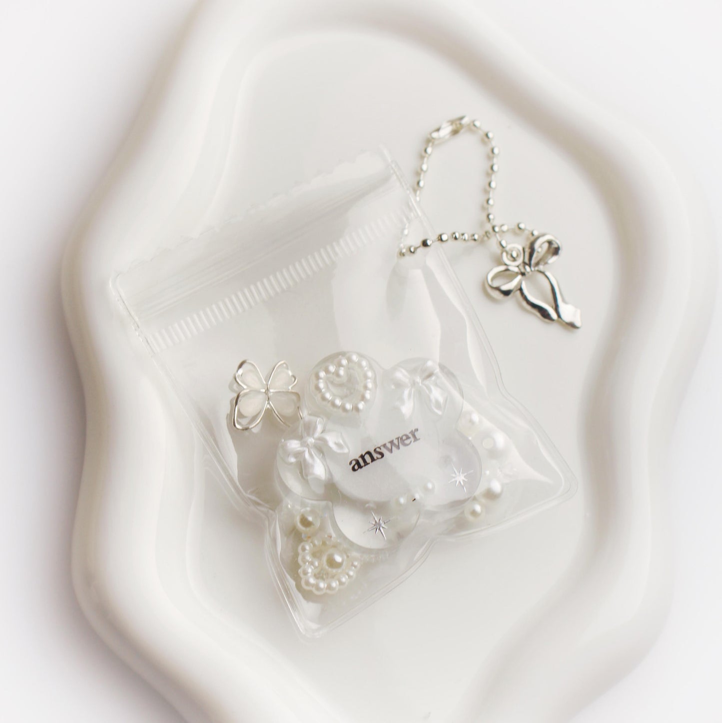 "Answer" flower pouch keychain