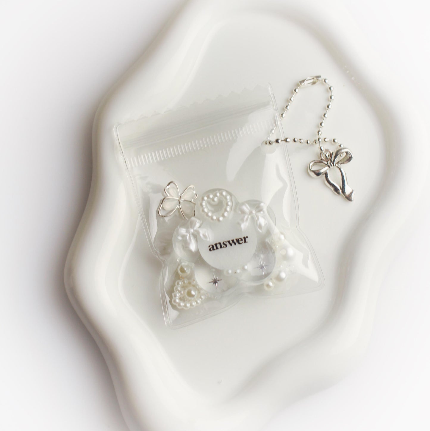 "Answer" flower pouch keychain