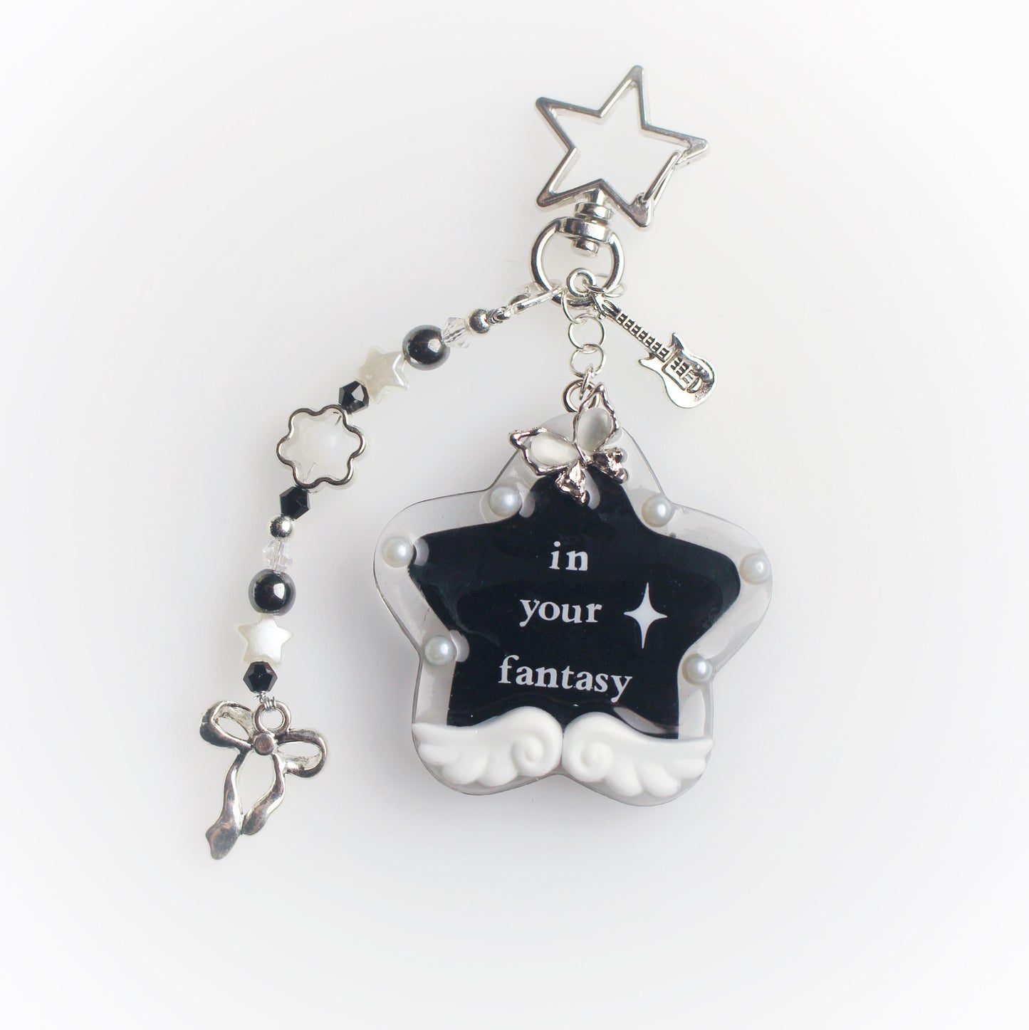 "In your fantasy" star keychain